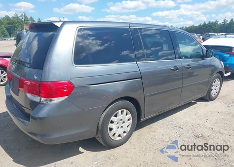 2010 Honda Odyssey Lx z USA, uszkodzony, nr VIN 5FNRL3H21AB059843
